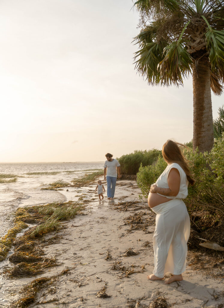 Family maternity photos at St. Marks Lighthouse, Florida.