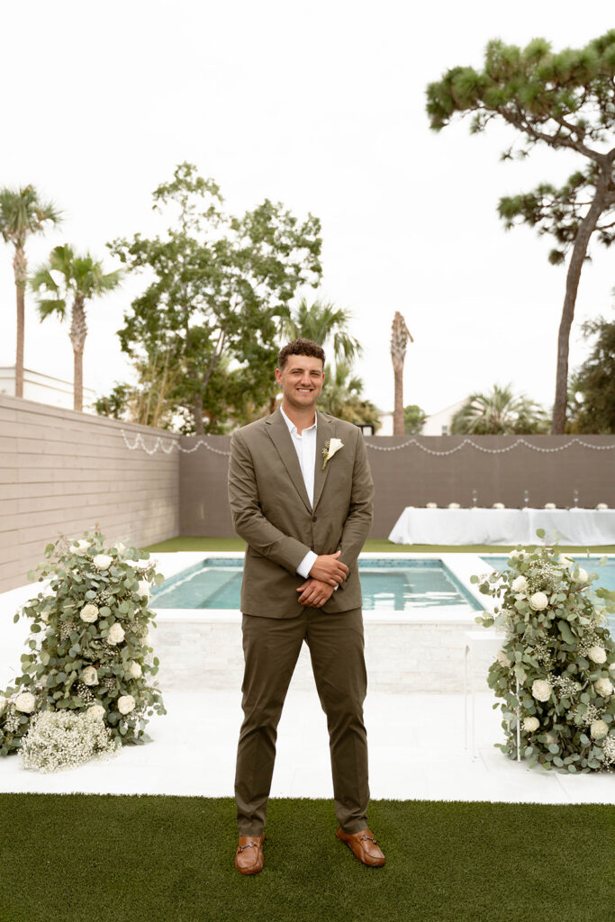 Groom in his wedding suit. 