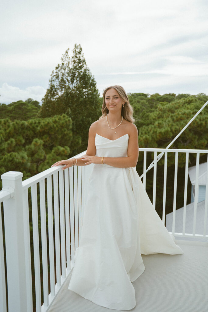 Bride standing on the rooftop.